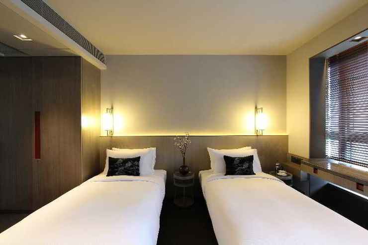 Suasana kamar V Hotels Residences and Serviced Apartments via Traveloka